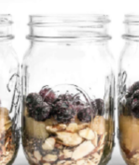 jar of oats, fruits, and nuts